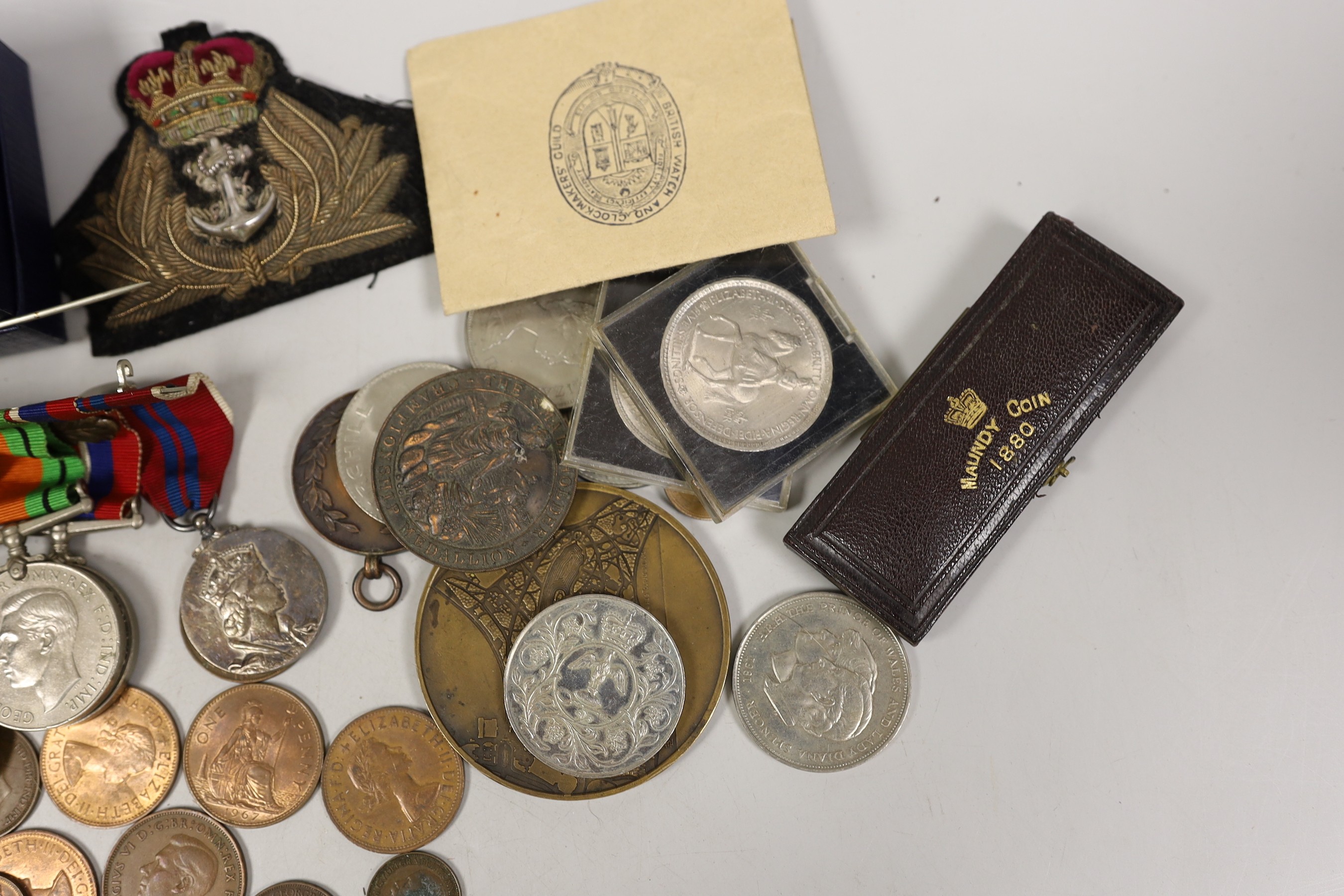 A WW2 to QEII M.B.E. group of eight medals to Lt. Cdr. F. S. Walford R.N., including naval general service medal with Minesweeping 1945-51 and Palestine 1956-1959 clasps , a cased Victoria Maundy coin set for 1880, an Ex